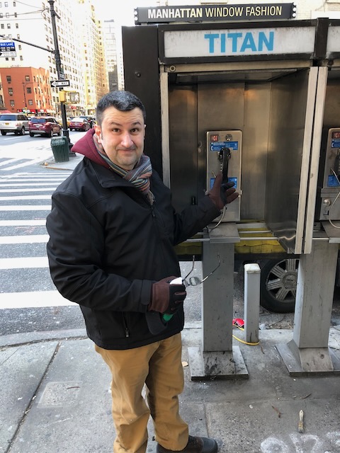 David at a payphone in New York